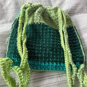 Green crochet drawstring backpack